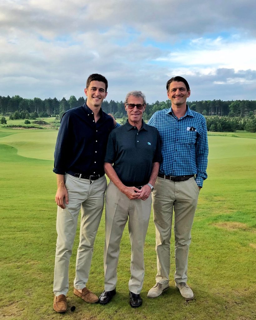 Mike Keiser in center with sons Chris (left) and Michael Jr. (right)