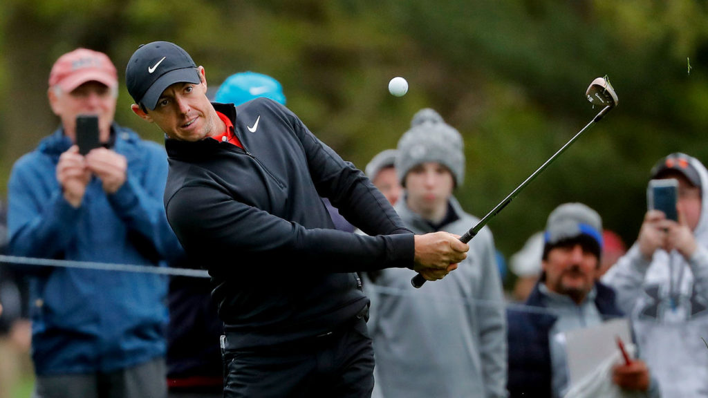 Rory McIlroy chips onto the seventh green during a practice round for the PGA Championship golf tournament, Tuesday, May 14, 2019, in Farmingdale, N.Y. (AP Photo/Julie Jacobson)