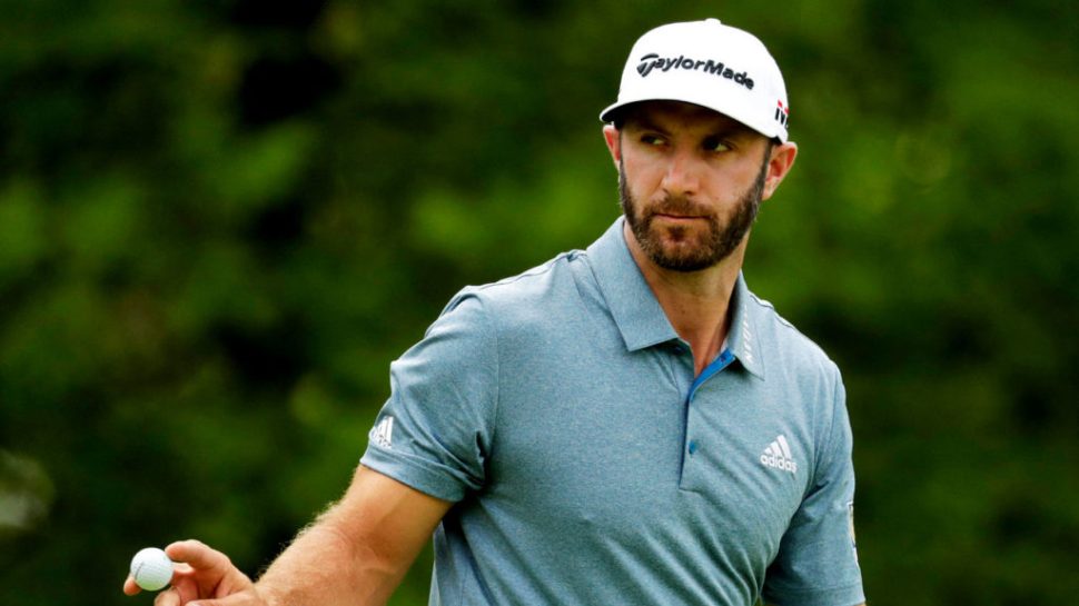 Dustin Johnson reacts after sinking a putt on the third green during the final round of the PGA Championship golf tournament, Sunday, May 19, 2019, at Bethpage Black in Farmingdale, N.Y. (AP Photo/Julio Cortez)