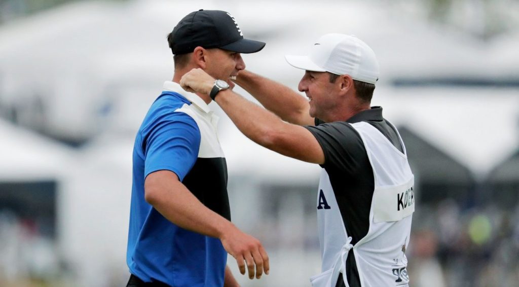 Brooks Koepka celebrates with his caddie Ricky Elliott after winning the US PGA Championship (AP Photo/Julio Cortez)