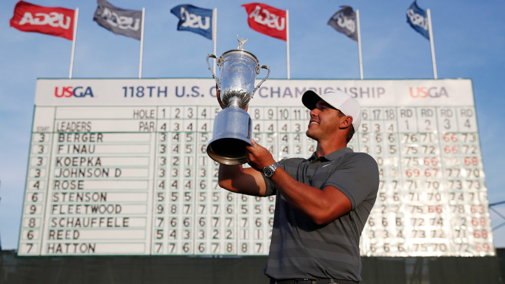 Brooks Koepka celebrates winning the 2018 US Open (Carolyn Kaster/AP)