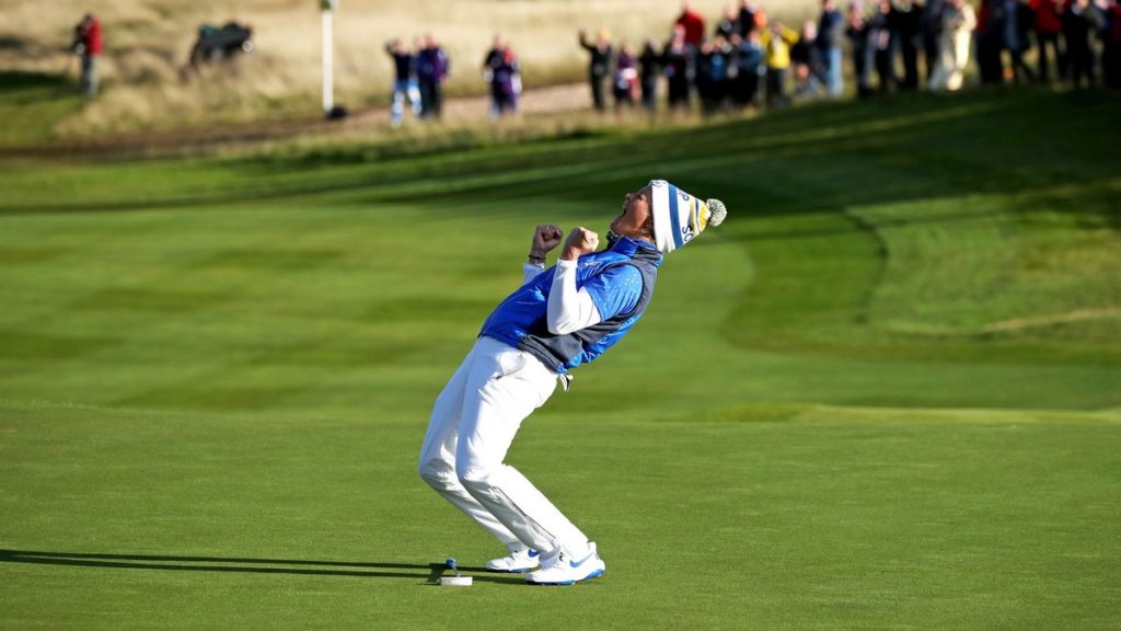 Suzann Pettersen celebrates her putt on the 18th to win the Solheim Cup for Europe in 2019.