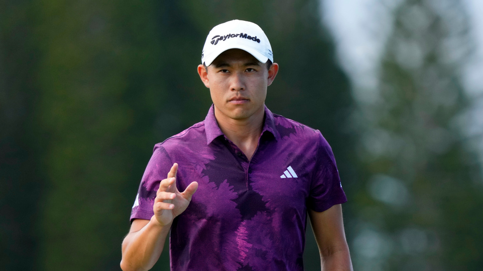 Collin Morikawa acknowledges the gallery after making his birdie putt on the ninth green during the third round of the Tournament of Champions golf event, Saturday, Jan. 7, 2023, at Kapalua Plantation Course in Kapalua, Hawaii. (AP Photo/Matt York)