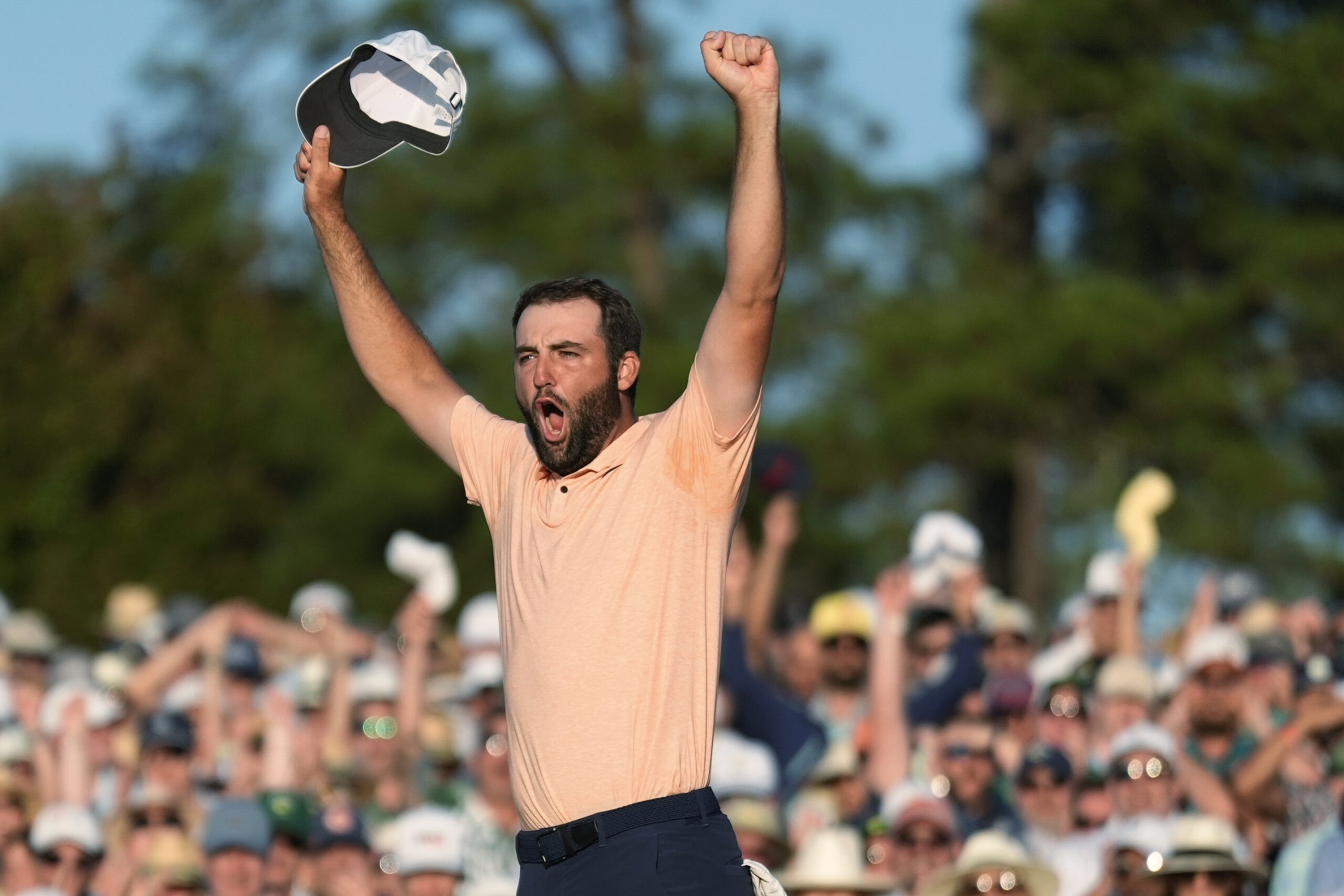 Scottie Scheffler celebrates his win at the Masters golf tournament at Augusta National Golf Club