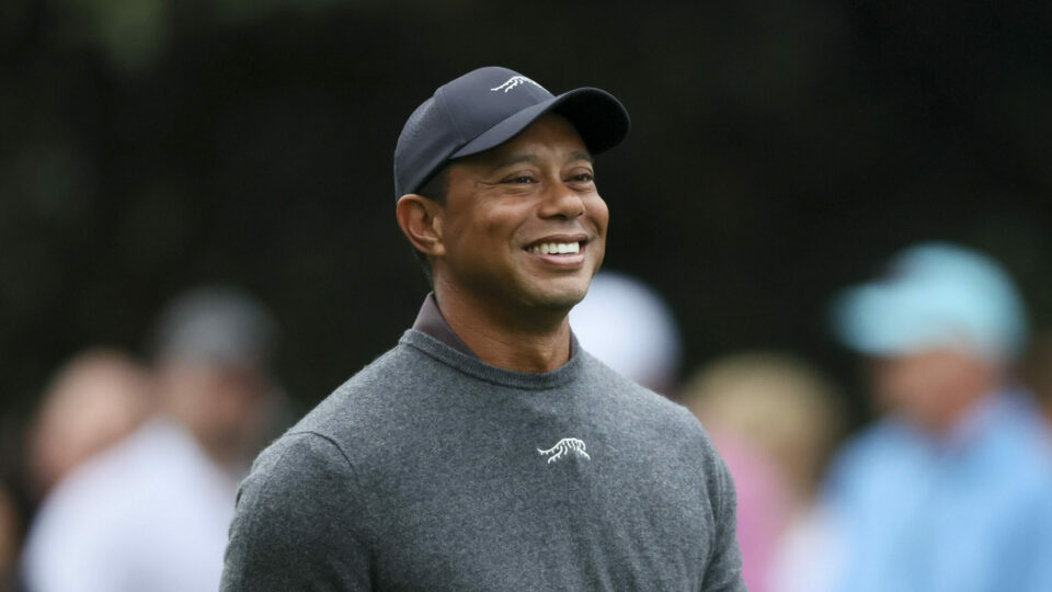 Tiger Woods smiles