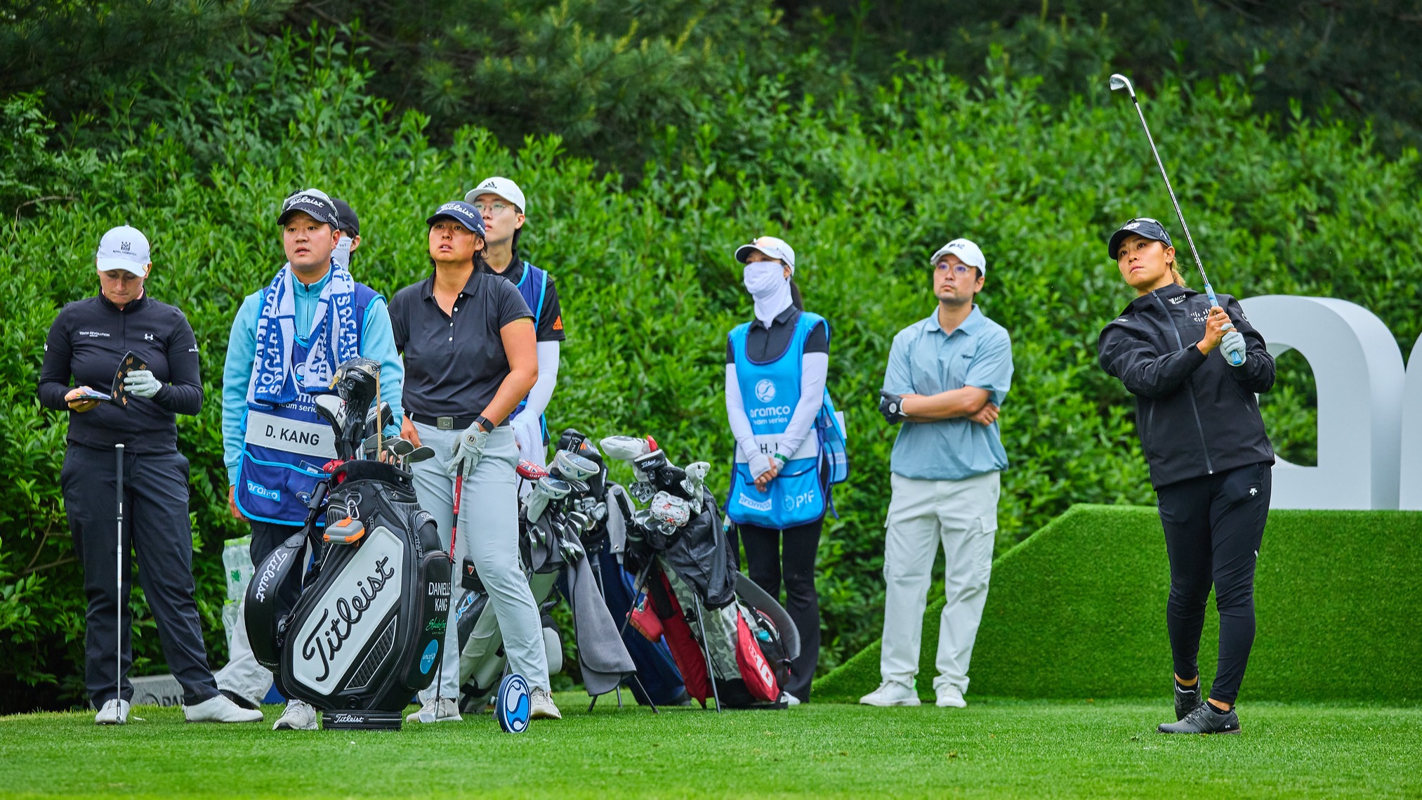 Team Kang on the tee at the Aramco Team Series