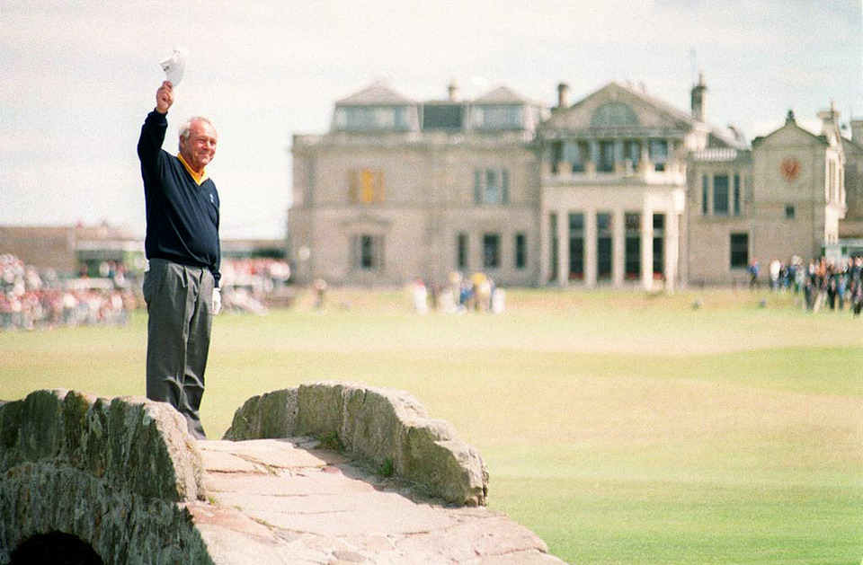 Arnold Palmer waves farewell to St Andrews on the Swilken Bridge at St Andrews.