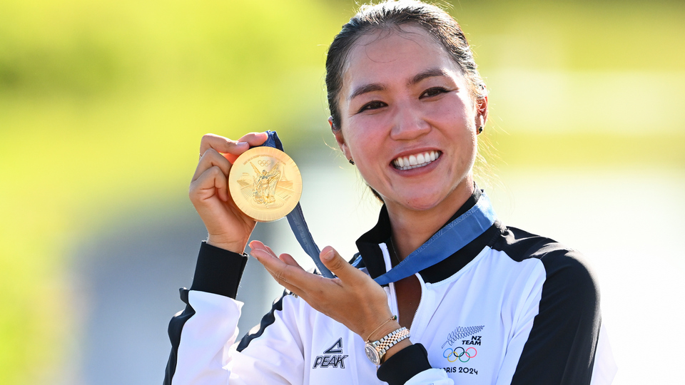 Lydia Ko of Team New Zealand holds the gold medal during the final round of the 2024 Paris Olympic Games at Le Golf National