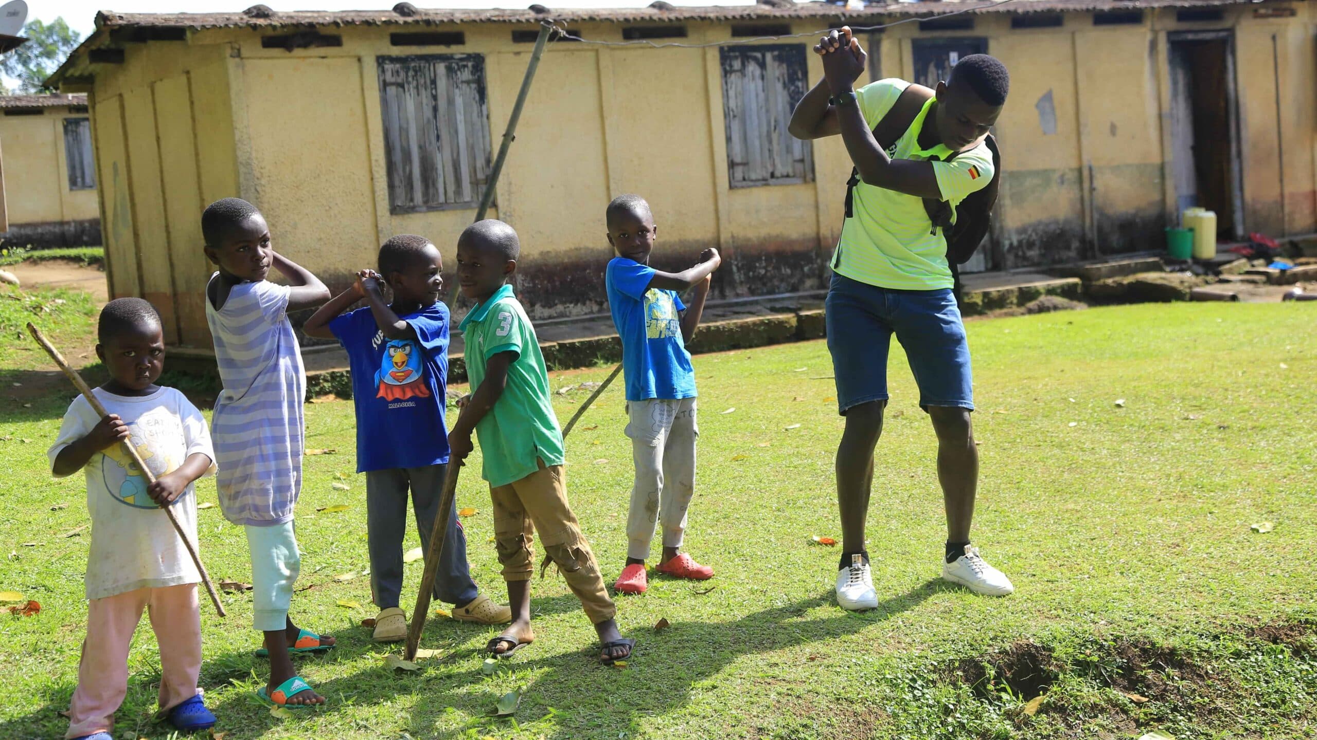 Isaiah working with children in the village outreach programme.