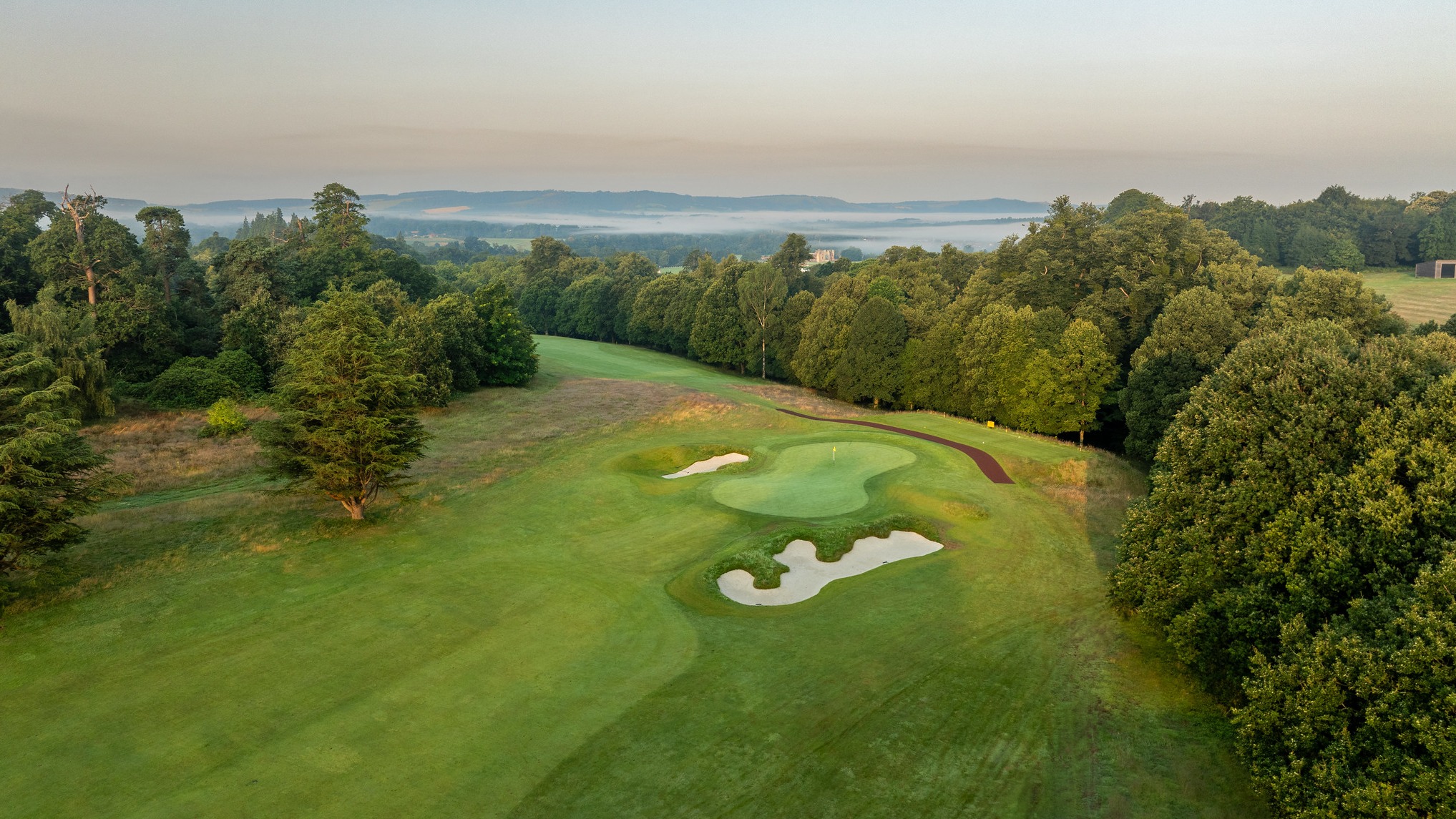 Set in the stunning South Downs, the championship course offers picturesque views and a challenging layout.