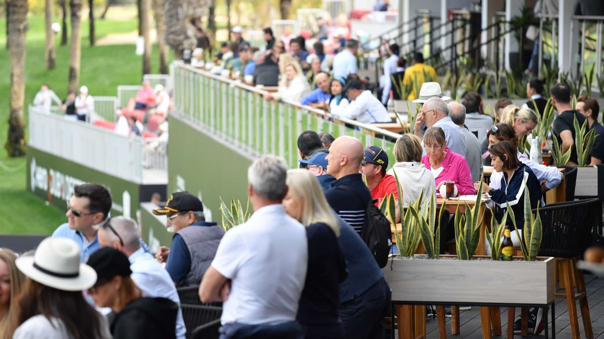 Fans enjoy the Hero Dubai Desert Classic Hospitality