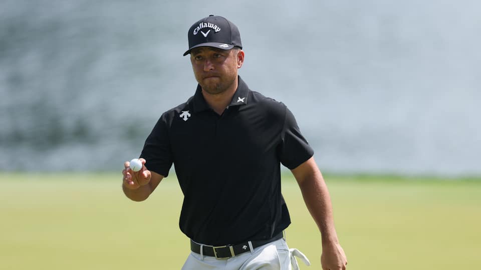 Xander Schauffele reacts on the 17th hole during the first round 