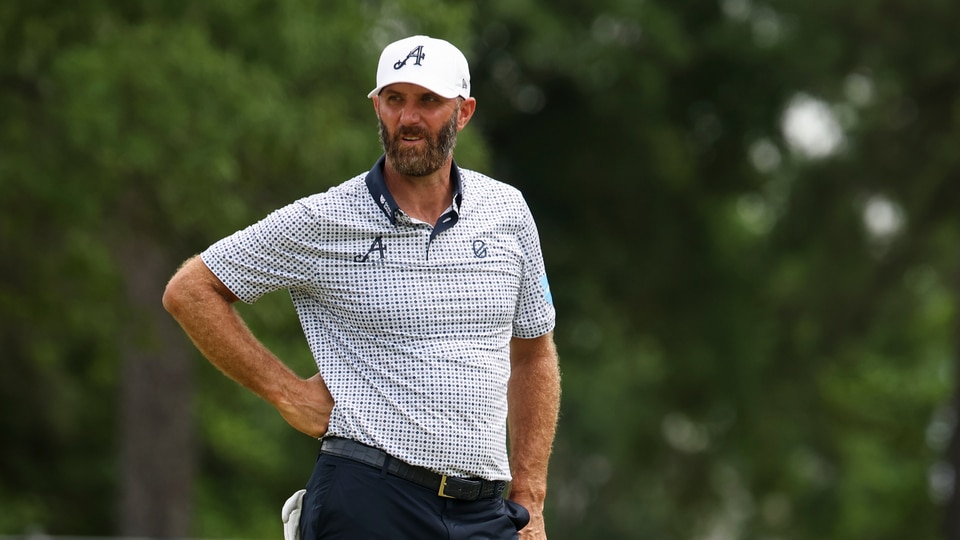 Dustin Johnson on the fifth hole putting green during the second round