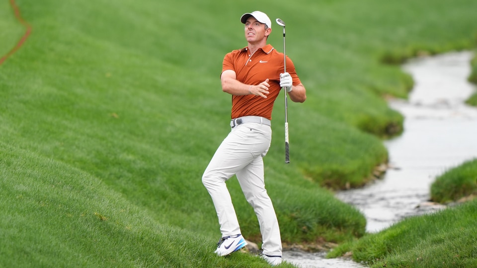 Rory McIlroy hits his second shot on the 18th hole during the second round 