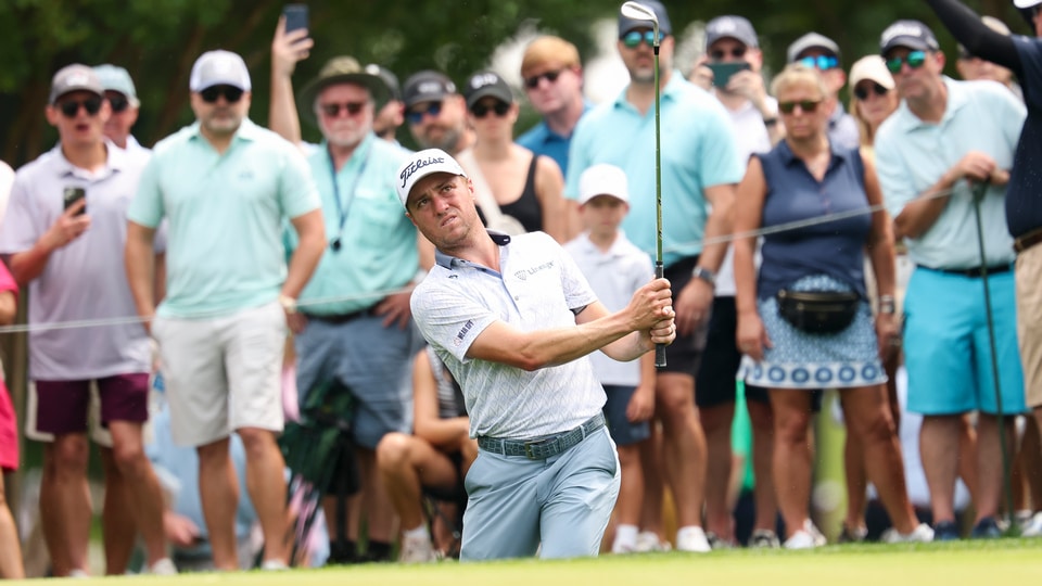 Justin Thomas chips onto the green on the fifth hole during the second round of the PGA Championship at Quail Hollow Club
