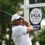 Jhonattan Vegas hits his tee shot on the first hole during the second round of the PGA Championship
