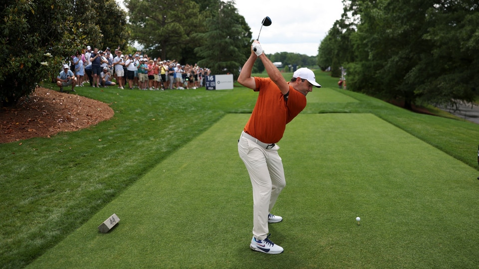 Scottie Scheffler hits his tee shot on the 16th hole during the PGA Championship Practice Round at Quail Hollow Club on Wednesday