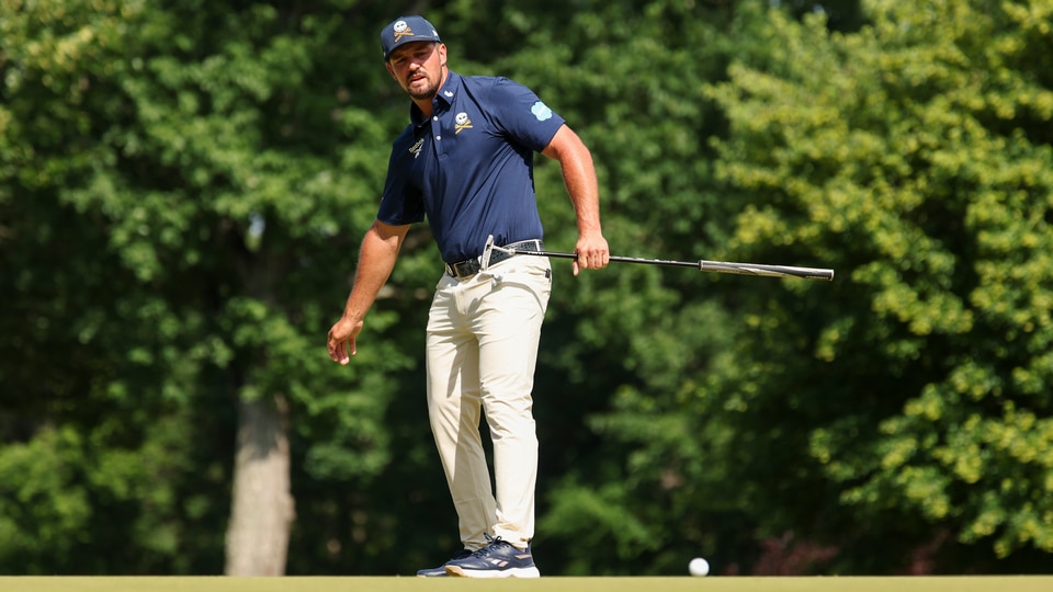 Bryson DeChambeau reacts to missing his putt on the 11th hole during the final round 
