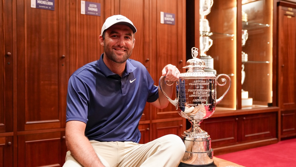 Scottie Scheffler poses with the Wanamaker trophy