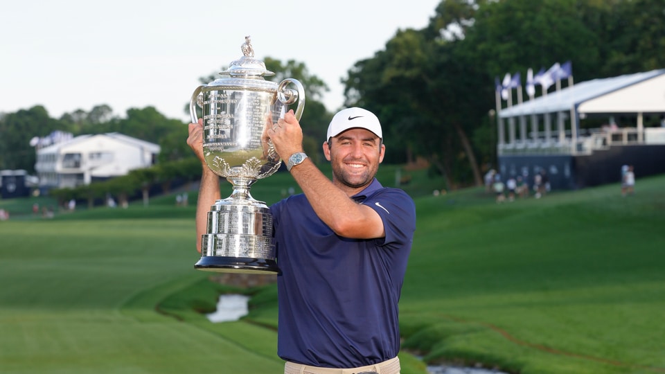 Scottie Scheffler poses with the Wanamaker trophy after winning the PGA Championship at Quail Hollow Club on Sunday