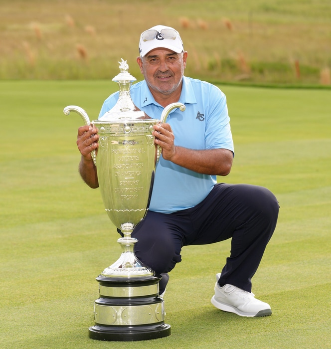 Angel Cabrera poses with the Alfred S. Bourne Trophy