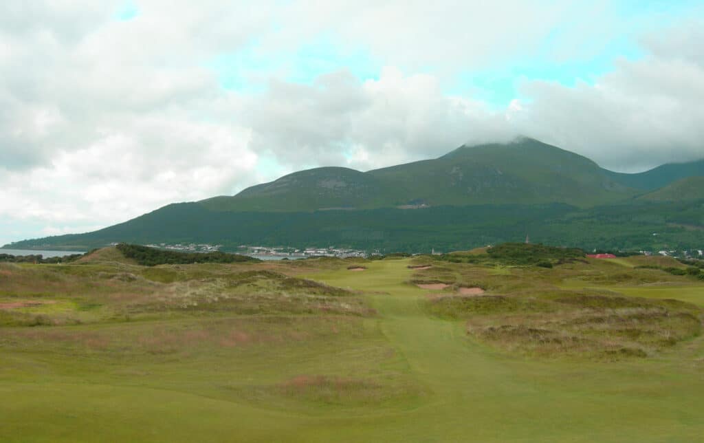 Royal County Down Golf Club in Northern Ireland offers a links experience that combines natural beauty with formidable golfing challenges.