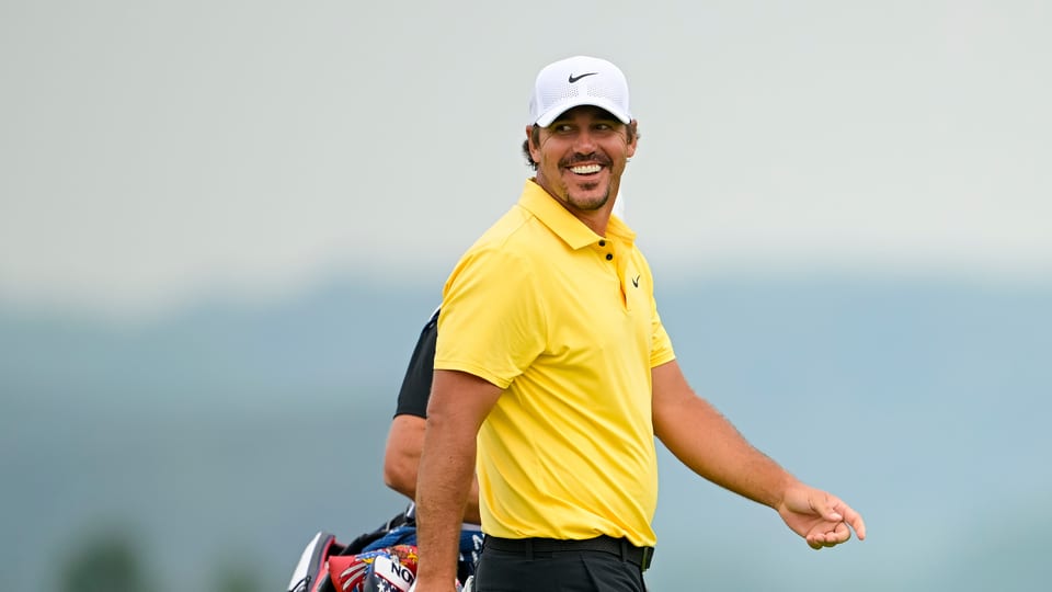 Brooks Koepka smiles on the 17th hole during the second round of the 2025 U.S. Open at Oakmont Country Club