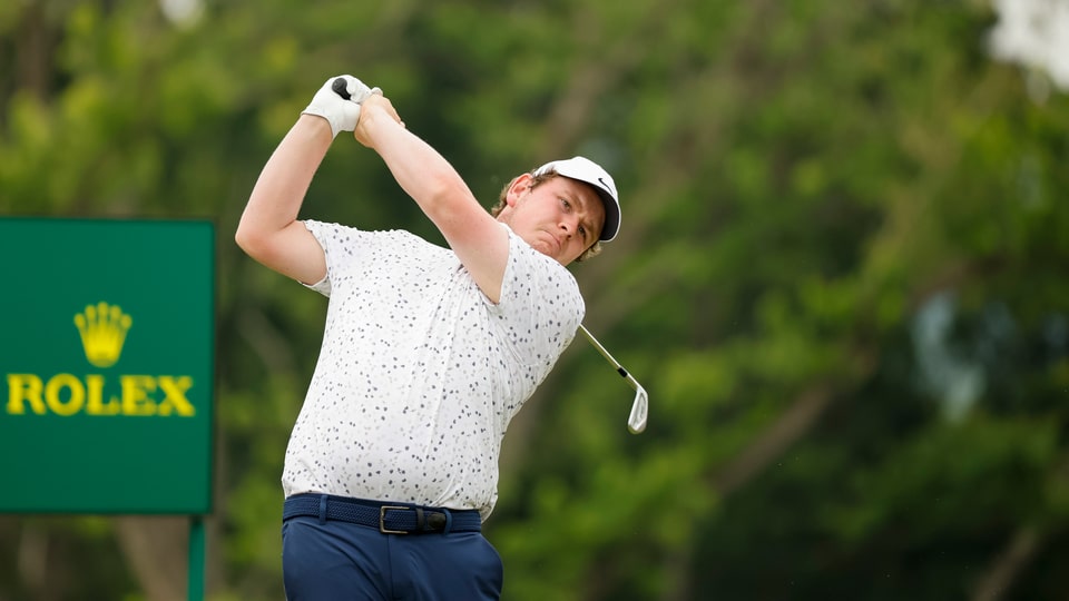 Robert MacIntyre plays a shot on the 16th hole during the second round