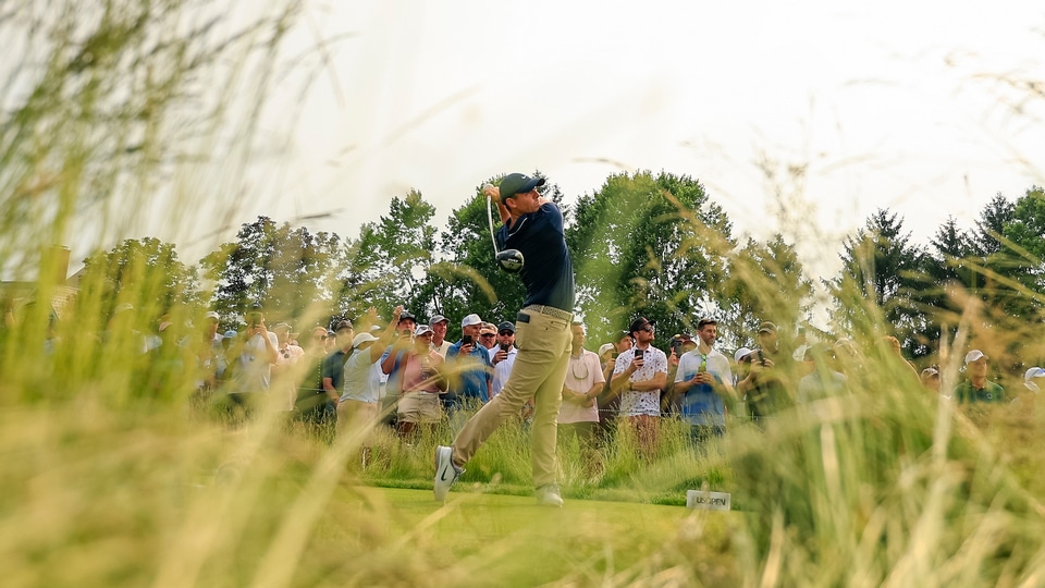 Rory McIlroy plays his tee shot on the 15th hole during the second round
