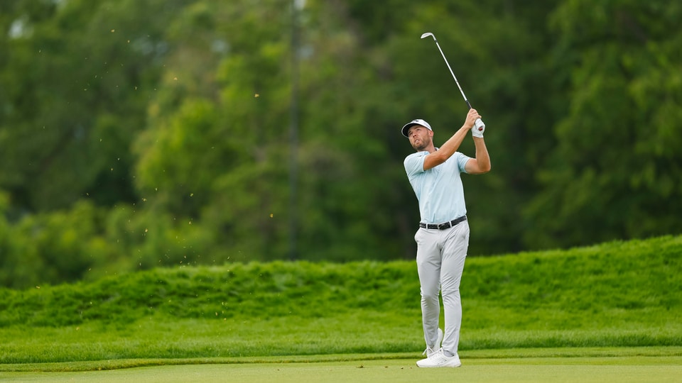Sam Burns plays his third shot on the seventh hole during the third round