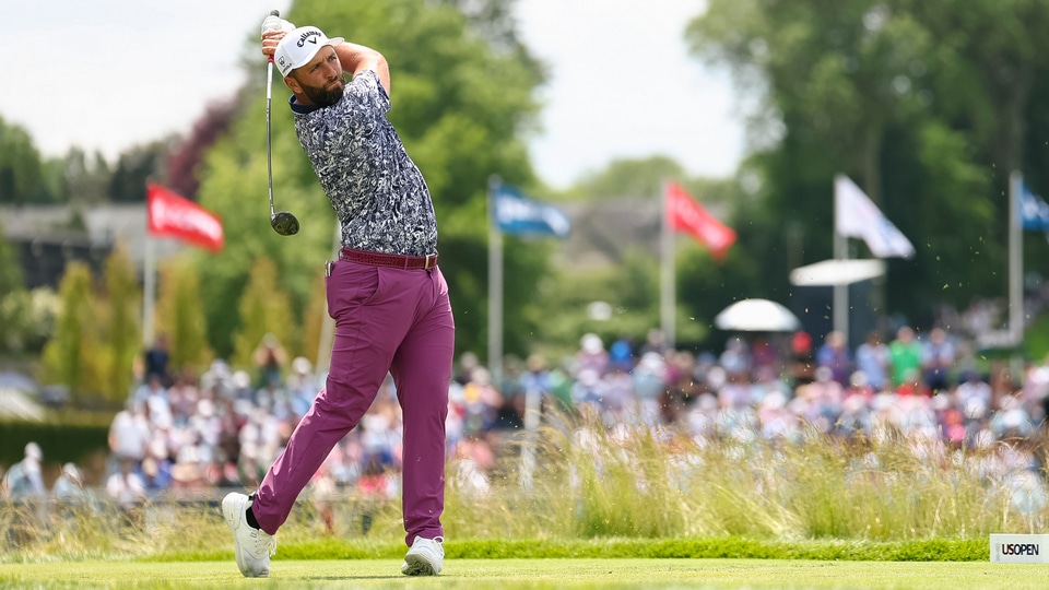 Jon Rahm plays his tee shot on the fifth hole during the third round of the 2025 U.S. Open at Oakmont Country Club