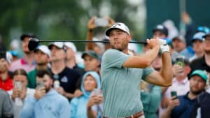 Sam Burns watches tee shot on the 15th hole during the final round of the 2025 U.S. Open at Oakmont Country Club