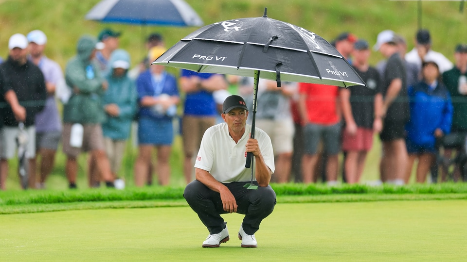 Adam Scott waits on the 12th green during the final round 