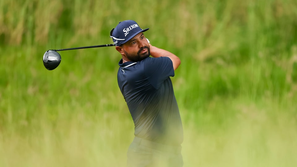 J.J. Spaun plays his tee shot on the seventh hole during the final round