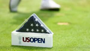 A detail of the 13th hole tee marker with folded flags during a practice round ahead of the 2025 U.S. Open at Oakmont Country Club in Oakmont, Pa.